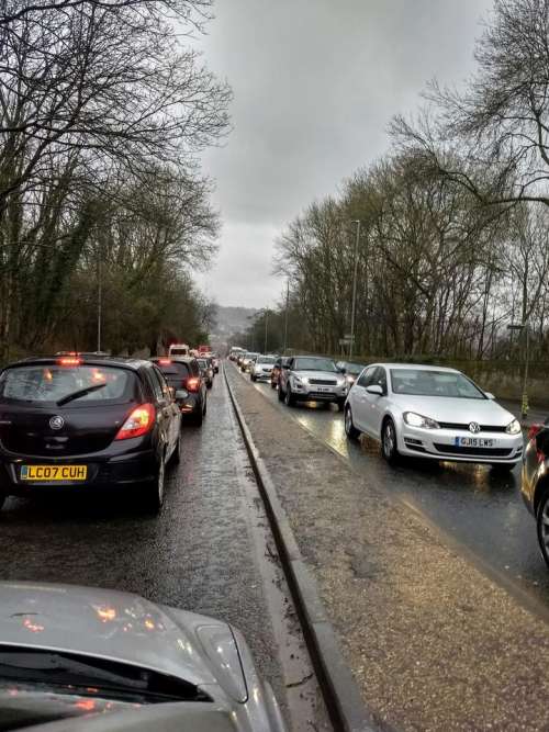 traffic jam hill cars rain