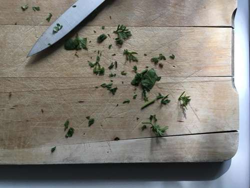 cilantro chopping cut knife cutting board