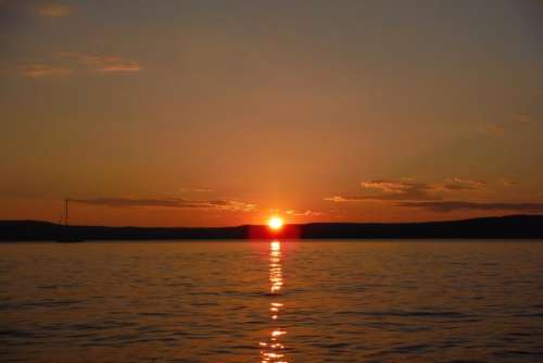 sunrise sunset lake water scenic