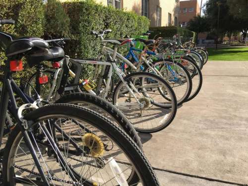 bikes bicycles biking bike rack sidewalk