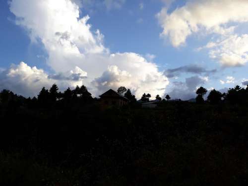 Nepal sillouhette clouds horizon treeline