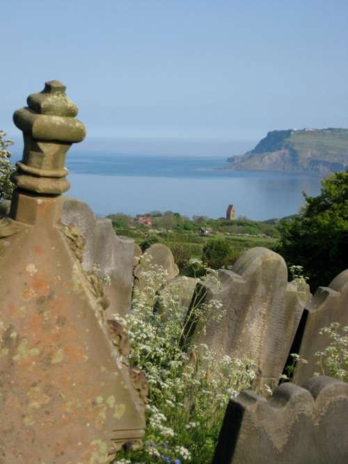 cemetery graves tombstones ocean view