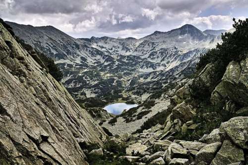lake rocks mountain landscape peak