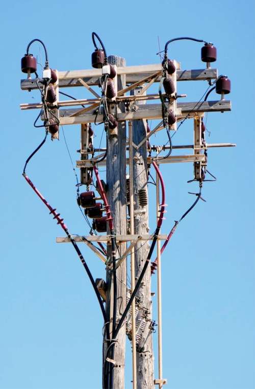 telephone pole cables wires communications wooden