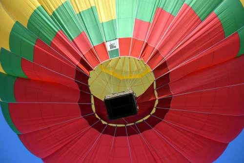 Hot air balloon preparation inflation start sky