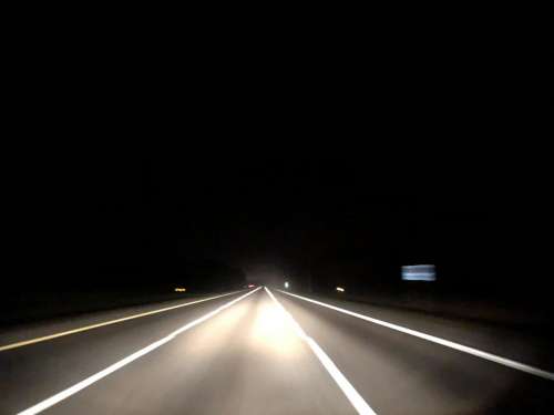 road driving nighttime highway