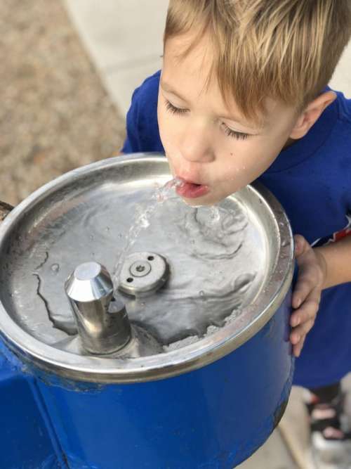 Fountain water boy drink drinking