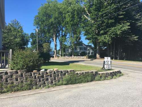 street road corner stone wall intersection