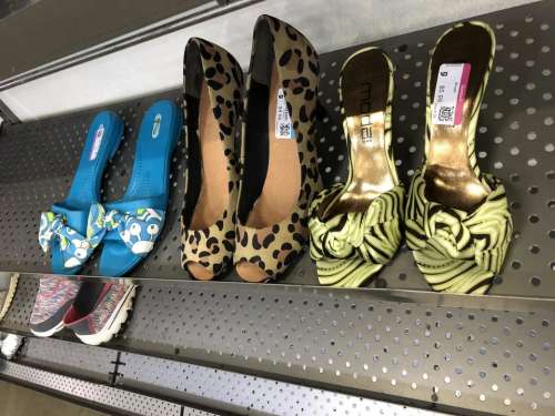 goodwill thrift store store shelf high heels shoes