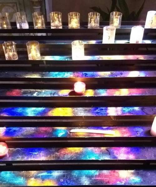 candles tray reflected lights rainbow votive