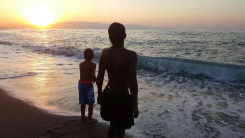 boys beach seashore ocean 