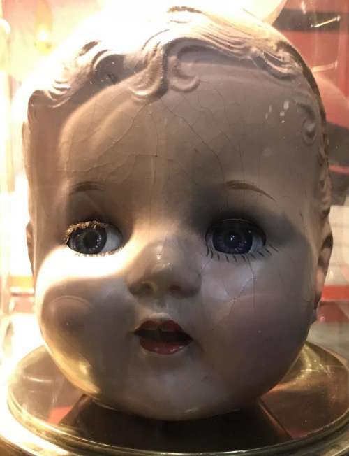 head baby doll death wierd