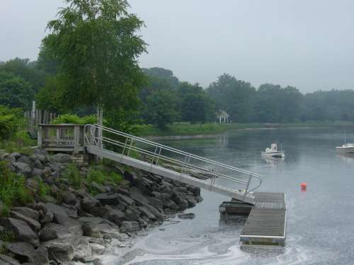 pier dock boat slip water rocky