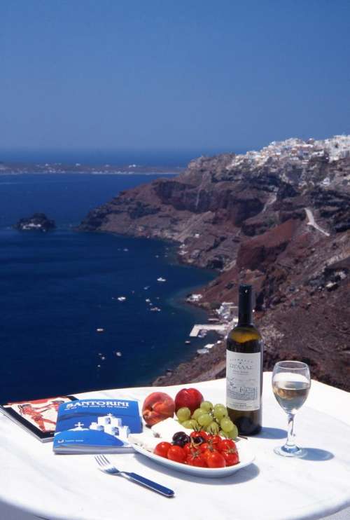 Greece   Santorini   dining   ocean   blue