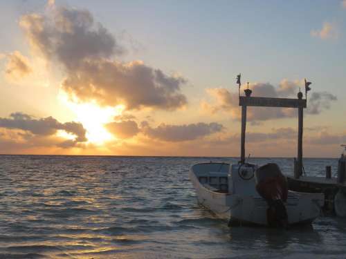 sunset mexico holbox island dock