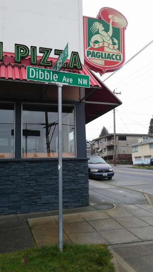 sign street dibble restaurant corner