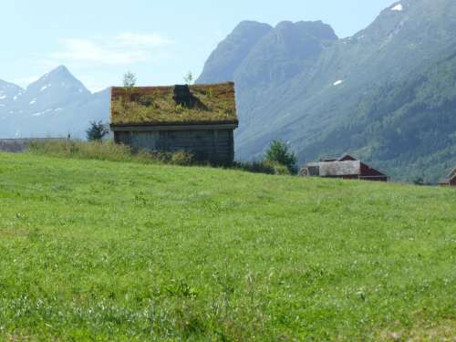Norway scenic view grass roof mountains