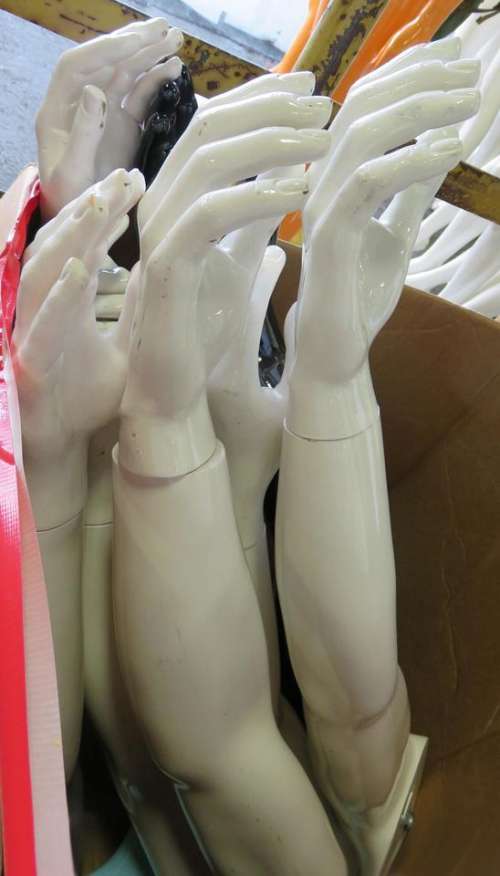 hands mannequin artificial arms reaching