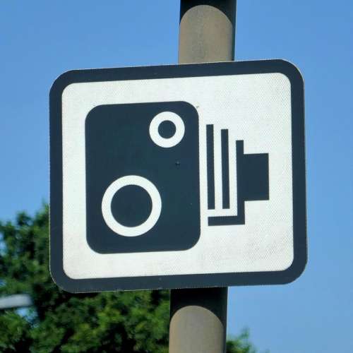 camera speed road sign slow