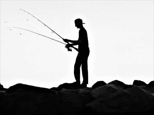 silouette shadow fishing young man