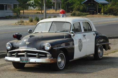 cop car vintage black and white red light police