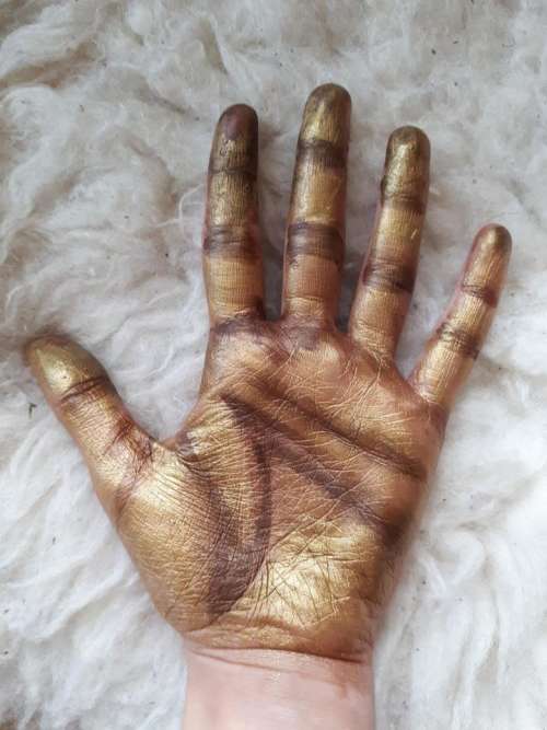 gold hand art inspiration pretty complex body art