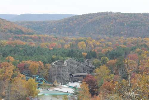 roller coaster amusement park autumn trees colorful trees