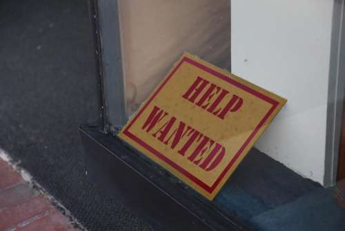 sign Help Wanted window yellow employment