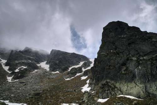 rocks mountain peak high