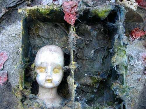 doll box decay death ruin