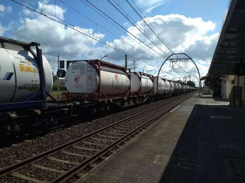 Goods train blue sky railway station france