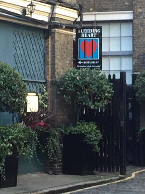 restaurant Bleeding Heart sign trees shrubs