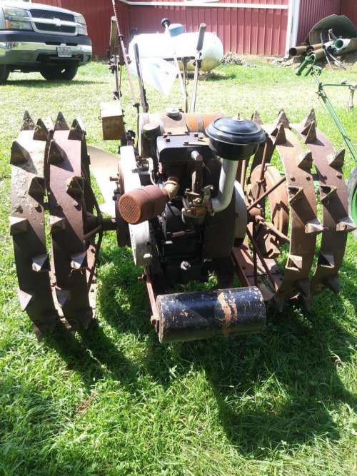 tractor spikes spiked wheel farm equipment Rough & Tumble