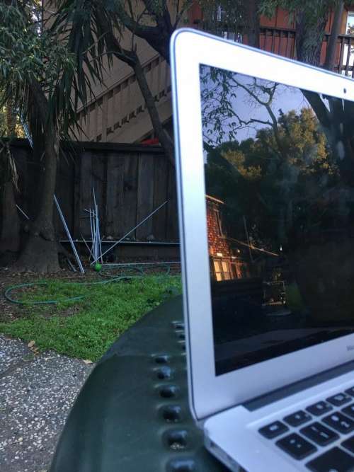 laptop reflection outside outdoors working 