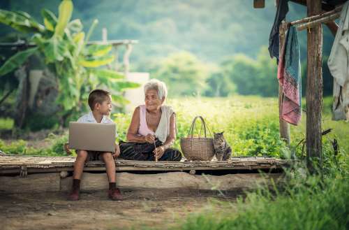 Grandmother with her grandson outdoors free image