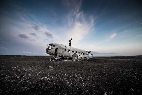 Man Standing on Top of the Iceland Famous Plane Wreckage