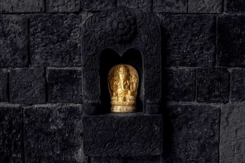 Image Statue Wall Gold Black Stone Sculpture