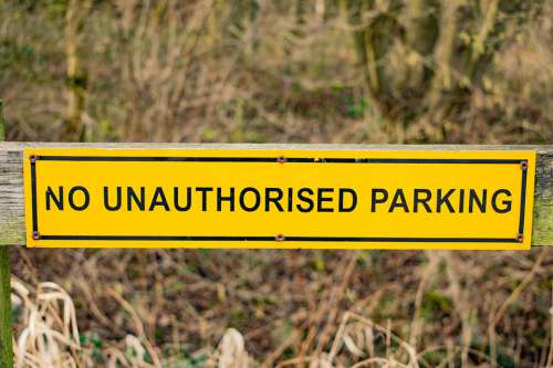 No Unauthorised Parking Sign Yellow Symbol Alert