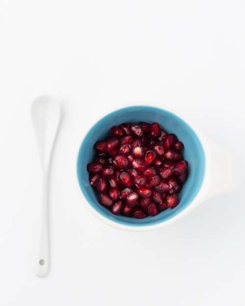 Pomegranate seeds in a bowl