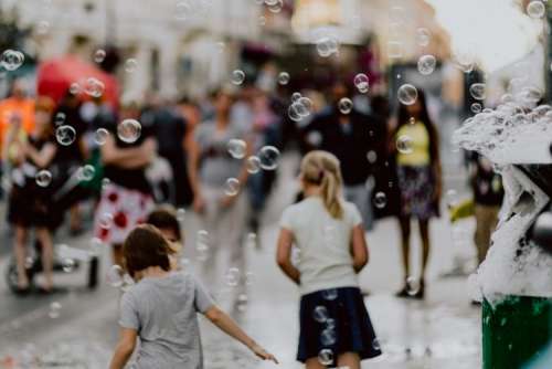A show of soap bubbles on Piotrkowska Street in Łódź, Poland