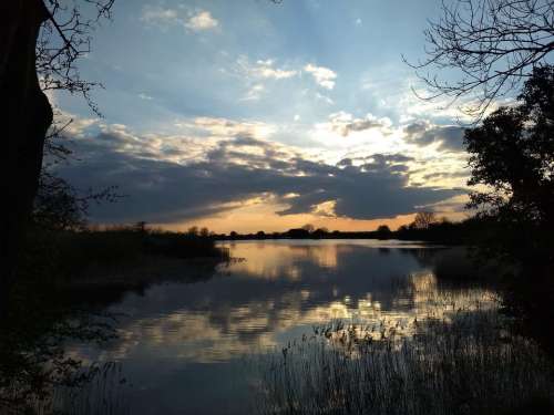 sunset lake golden sunset canal harmony