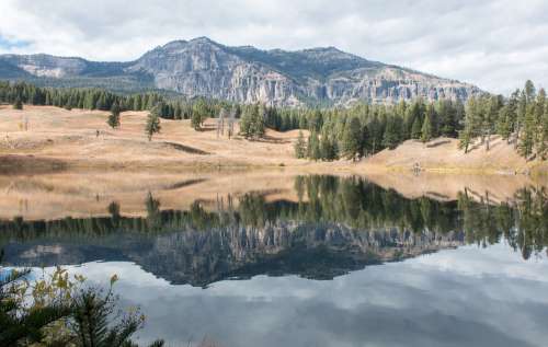 Alpine Lake Becomes A Natural Mirror Photo