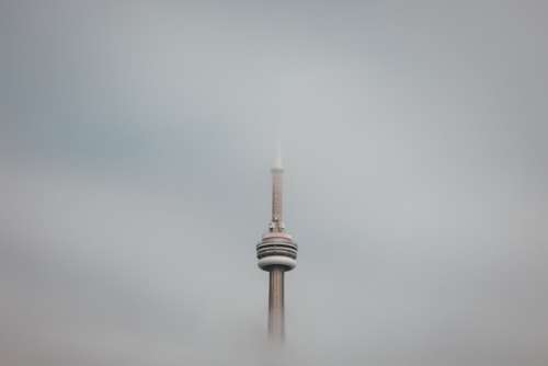The Toronto Tower Floats In The Clouds Photo