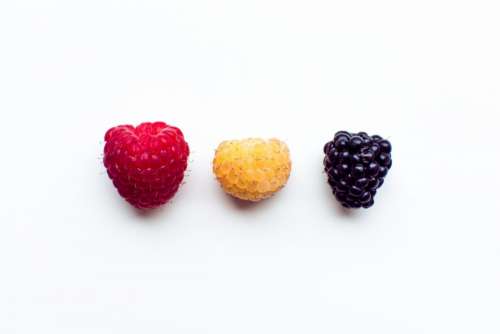 Colorful fresh berries on a white background