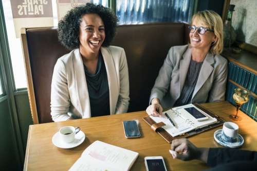 Businesswomen discussing and having fun