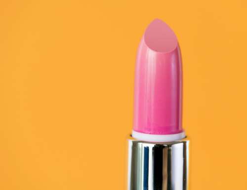 Closeup of pink lipstick for women