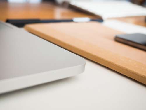 Desk with Sketchbook and Laptop