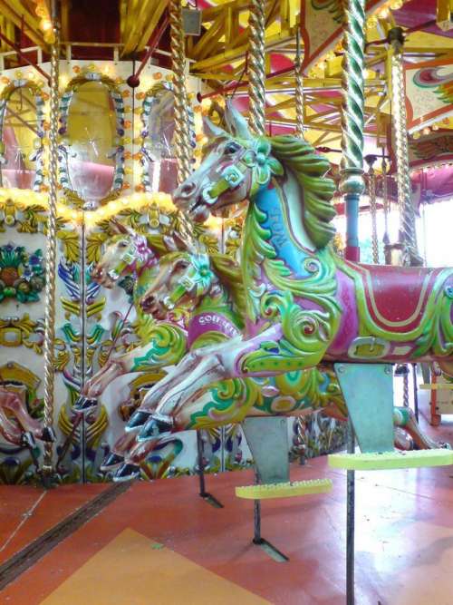 fairground merry-go-round horses painted colourful