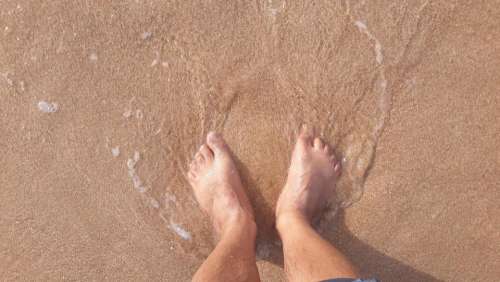 beach ocean seashore feet pawankawan
