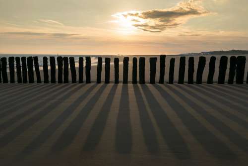 Groynes Sunrise Sea Sand Coast Sky Nature